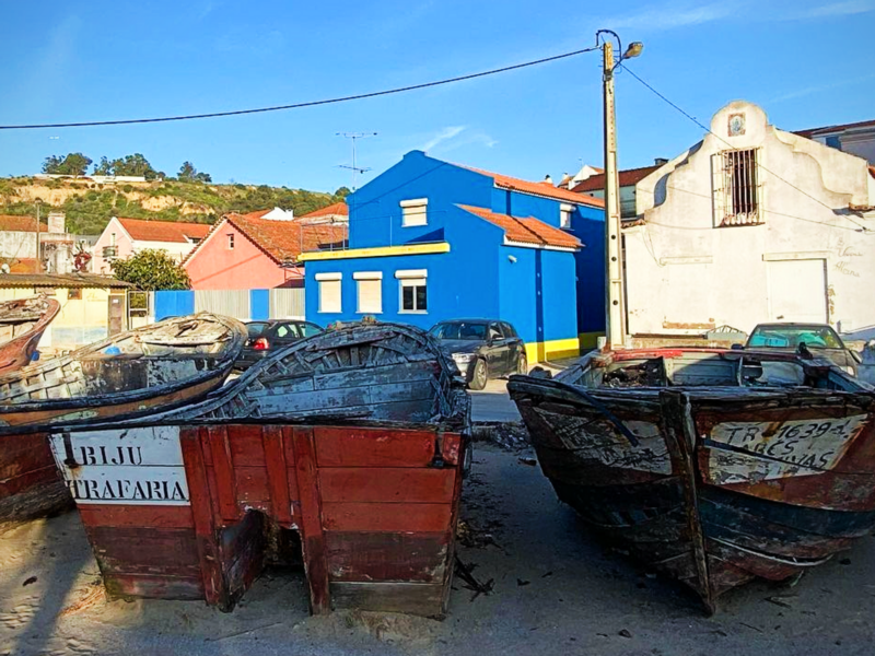 ​Boats sitting on the beach near Lisbon.