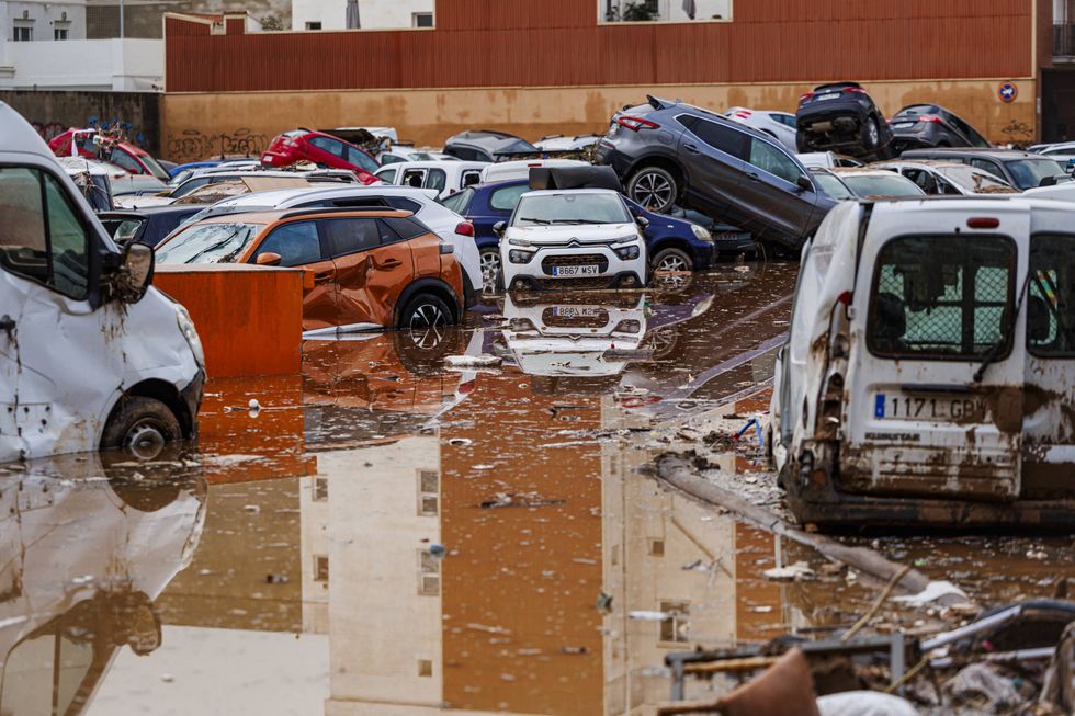 ​Cars pile up on Nov. 4, 2024 in the Spanish province of Valencia after major flash flooding.