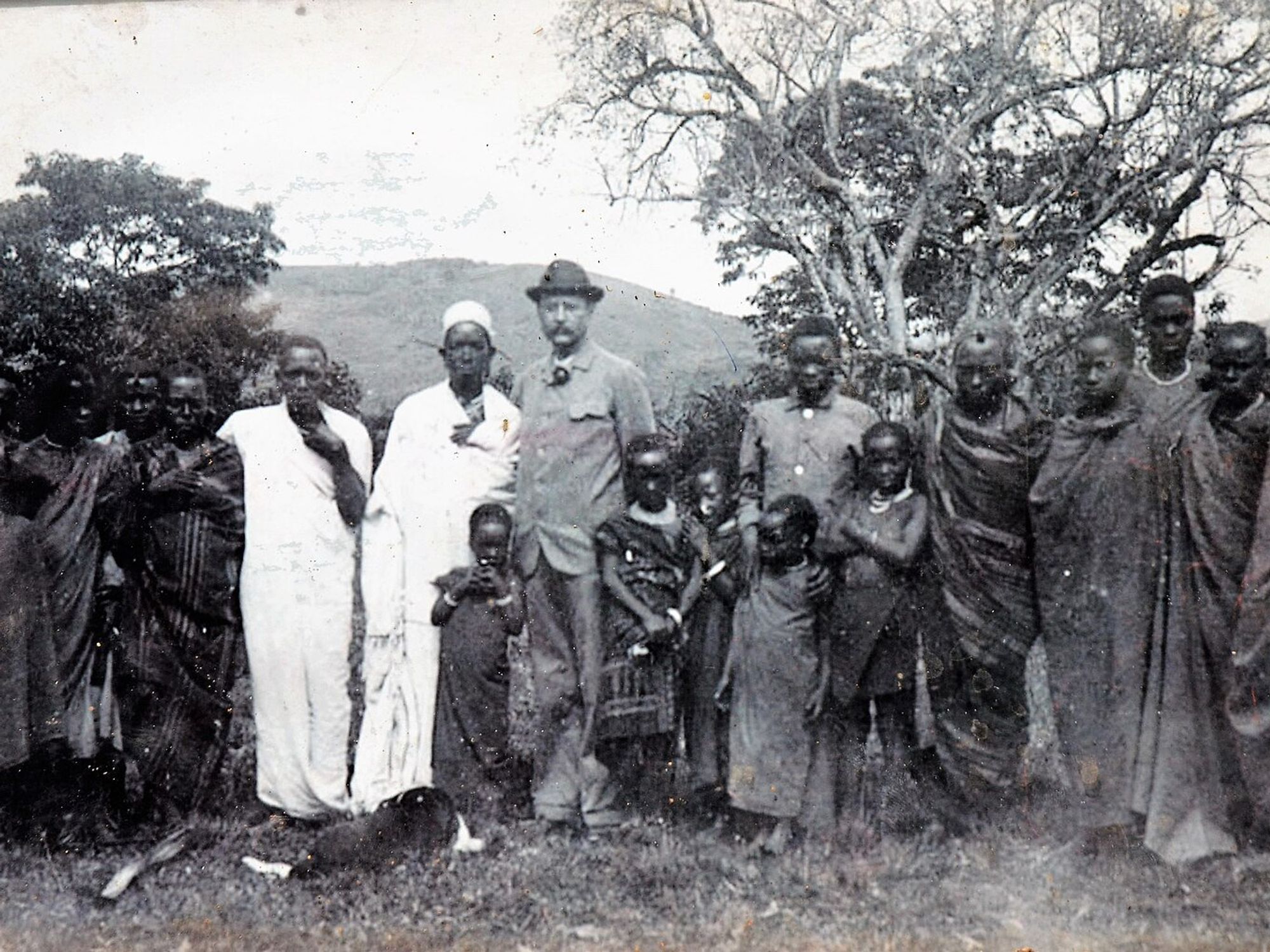 ​Chief Meli of the Chagga tribe, photographed as boy (center) standing next to German geographer Hans Meyer, 1870s.
