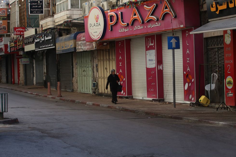 ​Closed stores in the West Bank city of Nablus. A comprehensive strike in the West Bank and east Jerusalem in protest of Israel's ongoing offensive in the Gaza Strip paralyzed all aspects of life in those Palestinian territories.