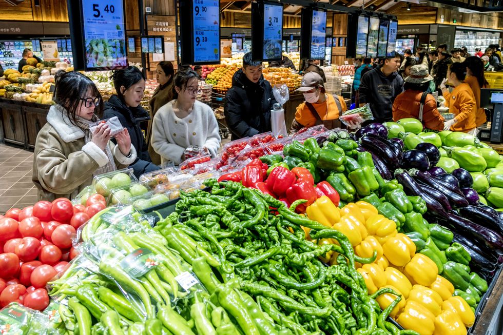 ​Customers shopping at the Yunding branch of a Pangdonglai supermarket in Xuchang city.