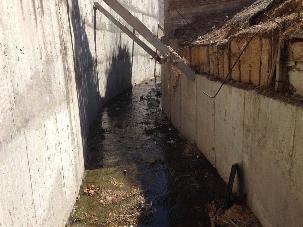 ​Drug lord Joaquin ''El Chapo'' Guzmán escaped police by walking along this drainage canal and tunnel behind a house in Culiacan, Mexico, in 2014.