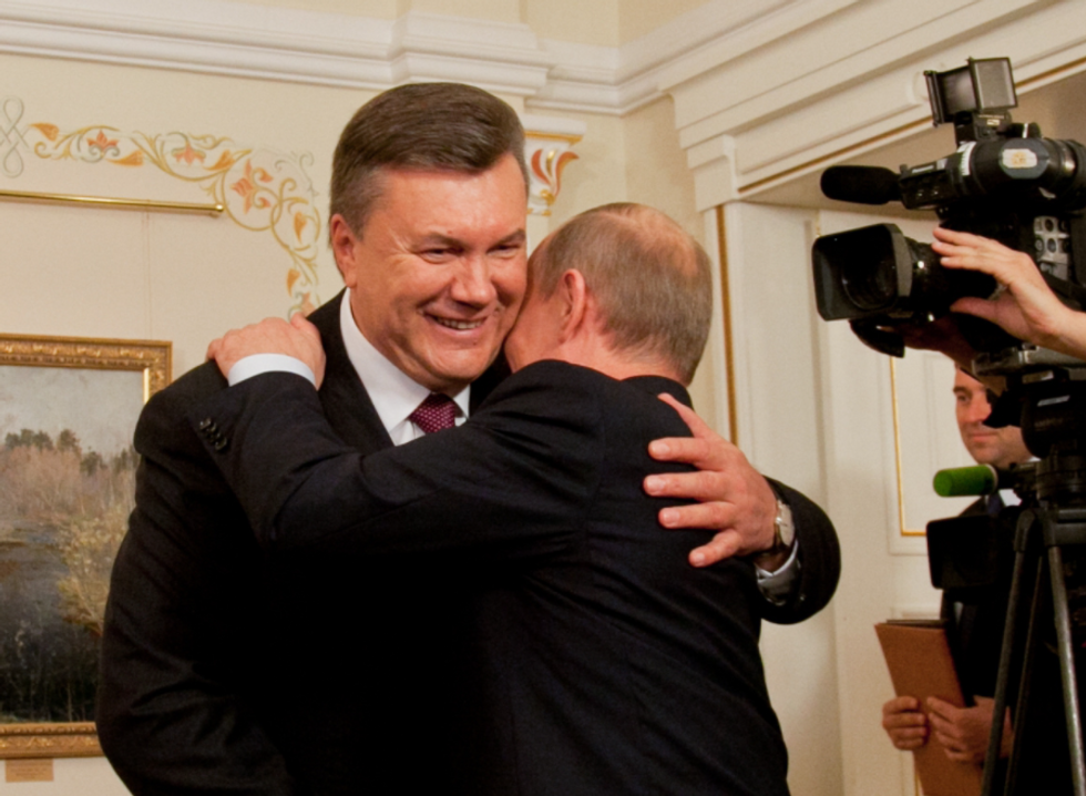 ​File photo of Putin welcoming then Ukrainian President Viktor Yanukovych in October 2012