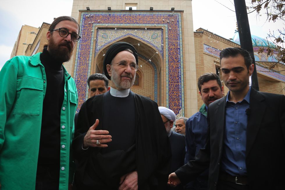 ​Former Iranian President Mohammad Khatami leaves a ceremony in Tehran.