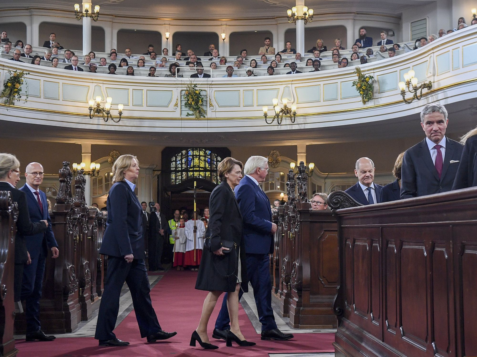 ​German elected officials attending a service at the Hauptkirche Sankt Michaelis.