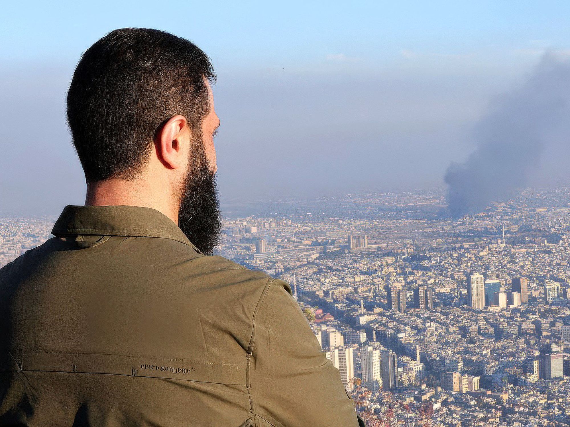 ​HTS (Hayaat Tahrir Al Sham) leader Ahmed Al-Shara, also known as Abu Muhammad Al-Jolani, commander in the operations department of the Syrian armed opposition watching Damascus from the Mount Qassyun, overlooking the capital after the overthrow of Bashar Al-Assad, in Damascus, Syria, on Dec. 9, 2024.