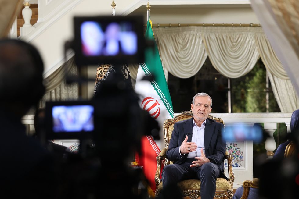 ​Iranian President Masoud Pezeshkian speaks in a live televised interview on state TV in Tehran, Iran, Dec. 3, 2024.