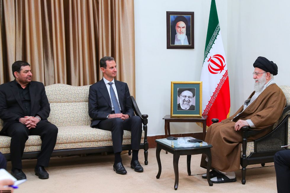 ​Iranian Supreme Leader Ayatollah Ali Khamenei meets with Syrian President Bashar al-Assad and Iranian Acting President Mohammad Mokhber in Tehran.