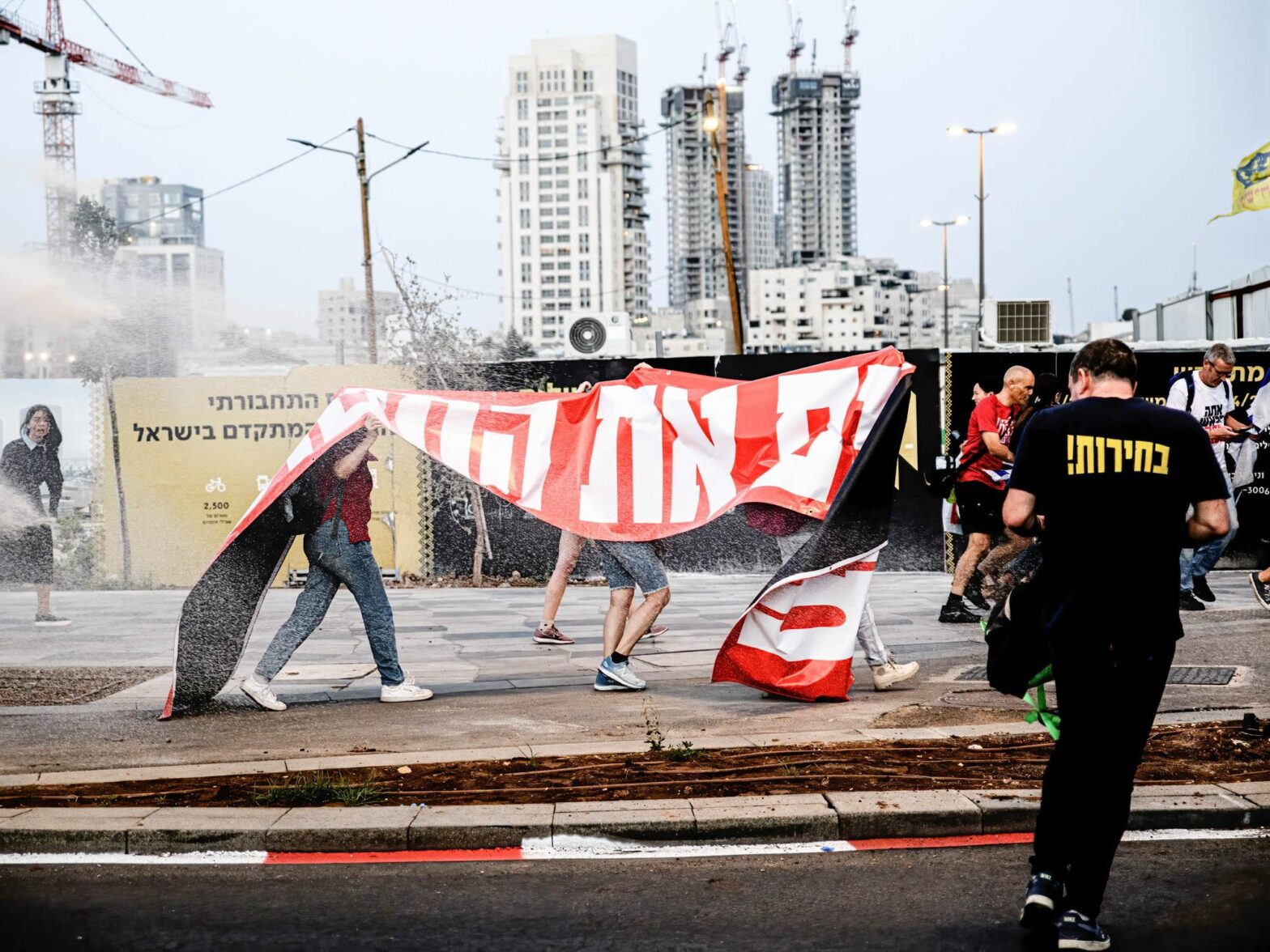 ​Israeli police use a skunk water cannon to disperse protestors during the demonstration on May 20th, 2024.