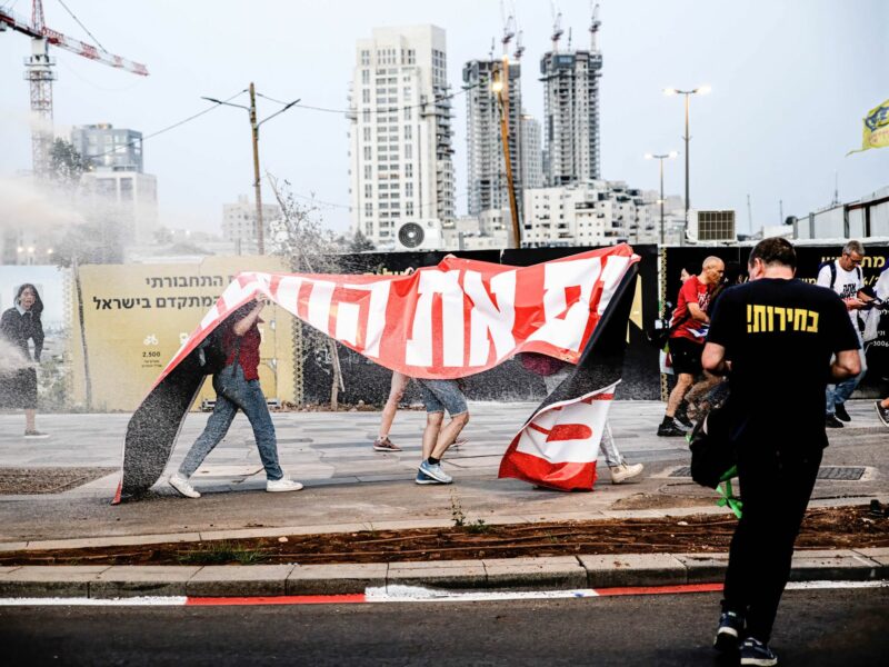 ​Israeli police use a skunk water cannon to disperse protestors during the demonstration on May 20th, 2024.