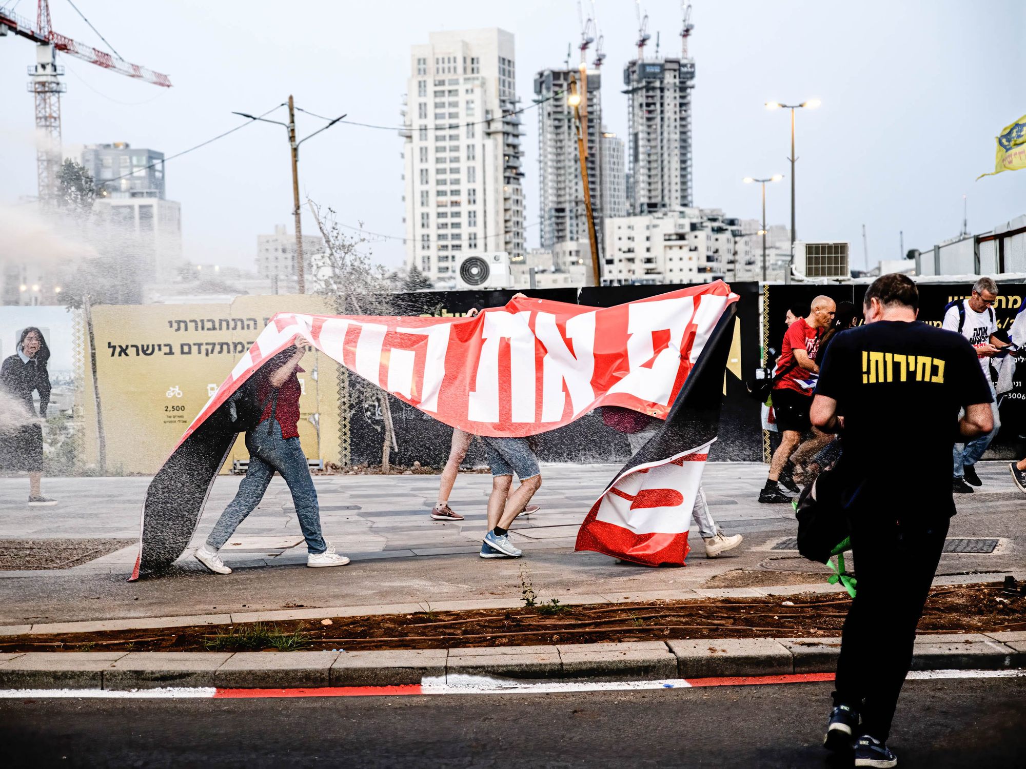 ​Israeli police use a skunk water cannon to disperse protestors during the demonstration on May 20th, 2024.