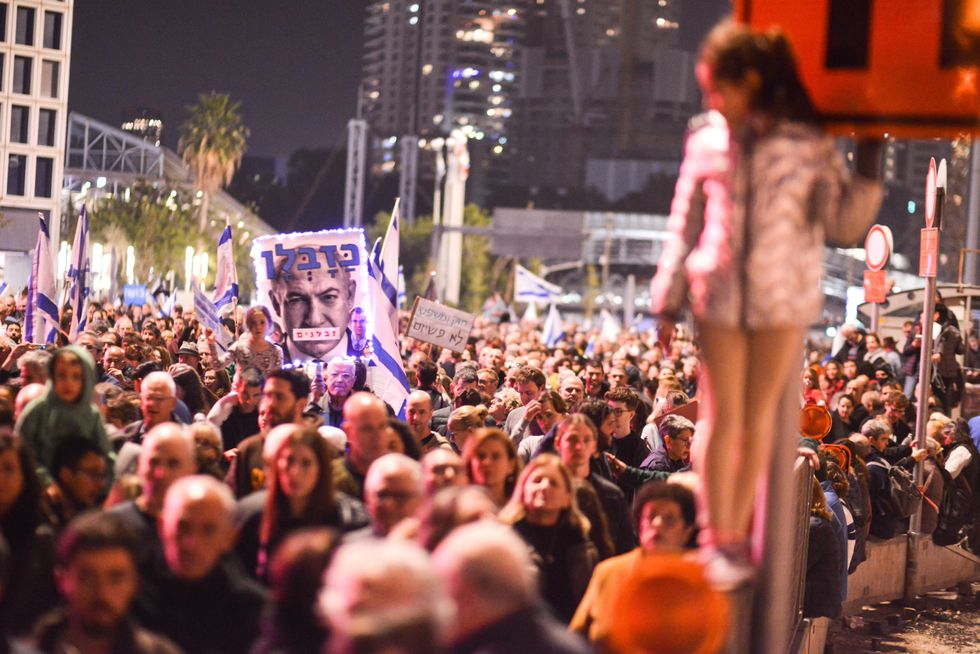 ​January 21, 2023, Tel Aviv, Israel: Protesters gather at Azrieli junction during the demonstration against Netanyahu's far-right government