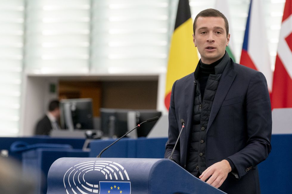 ​Jordan Bardella speaking at a EU podium.