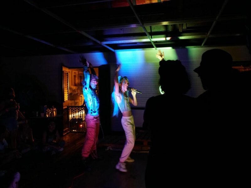 ​Kariel Argenis, left, dances with Ana Macho, right, a nonbinary reggaeton singer, at the Casa Cultural Ruth Hernández Torres, in Puerto Rico.