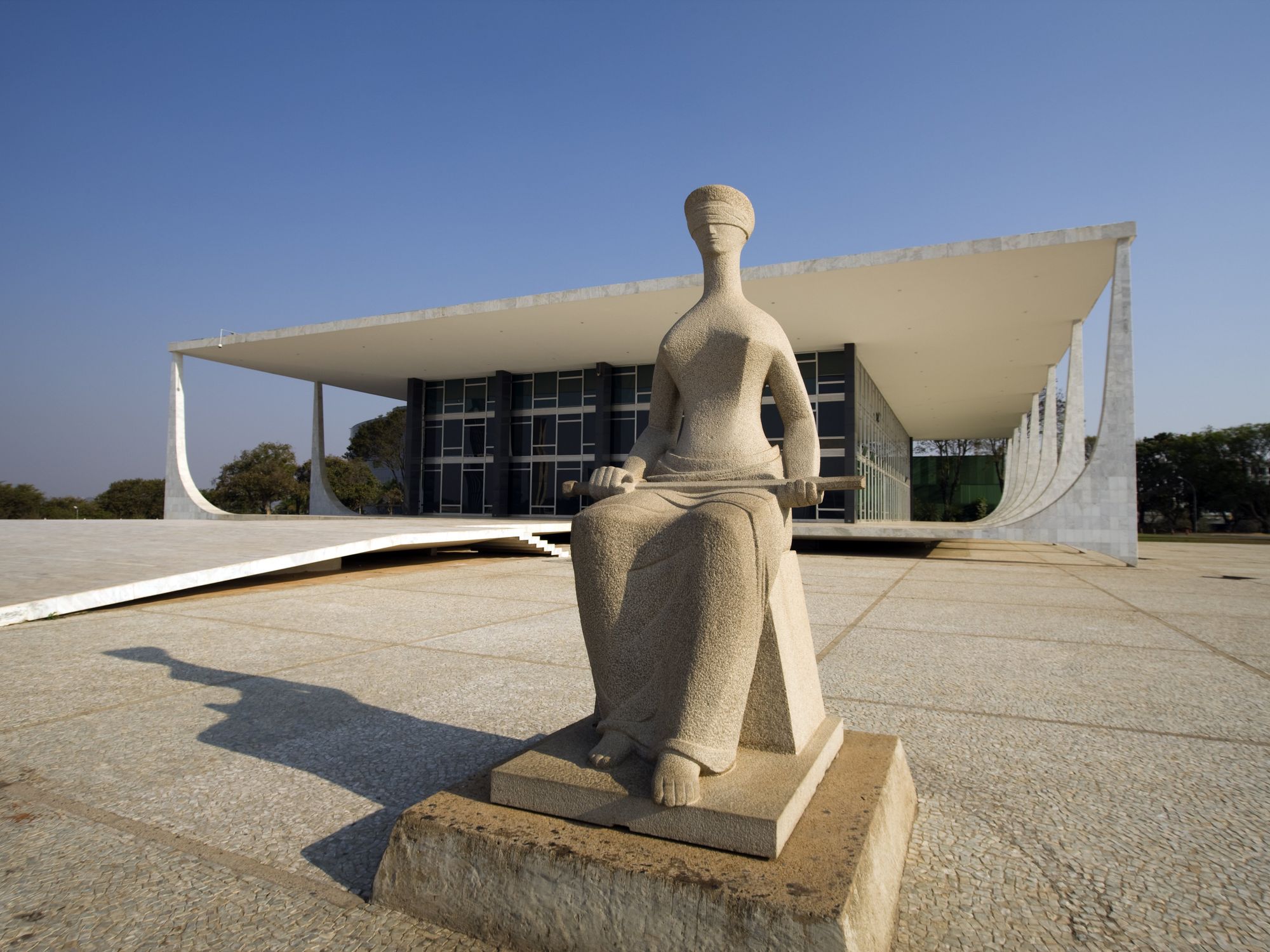 ​Lady justice is seen in front of the Brazil's Federal Supreme Court in a dress.