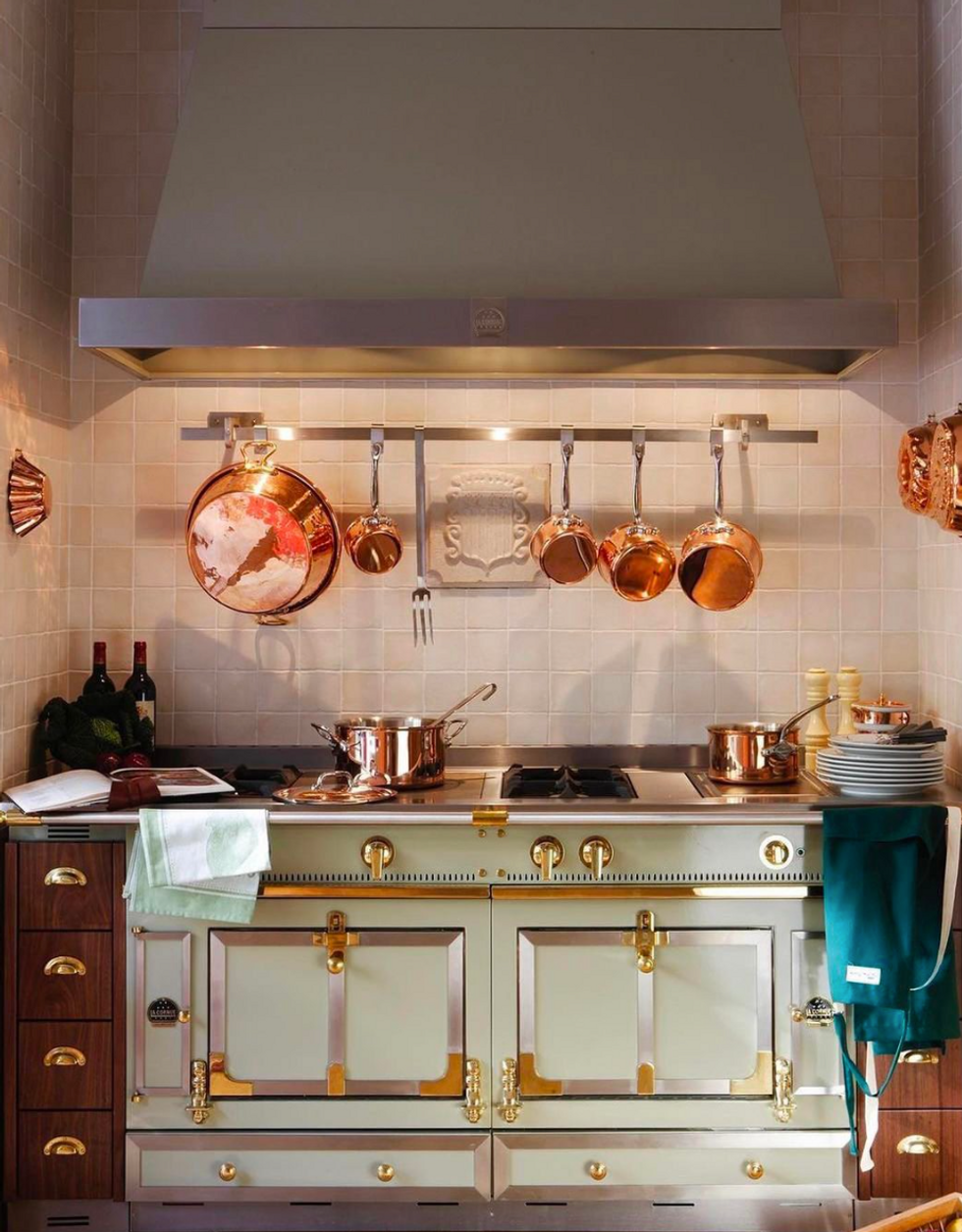 ​Light green La Cornue kitchen.