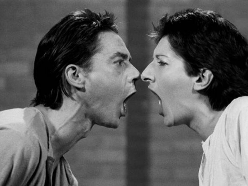 ​Marina Abramović and Ulay screaming at each other during their 1978 performance "AAA-AAA"
