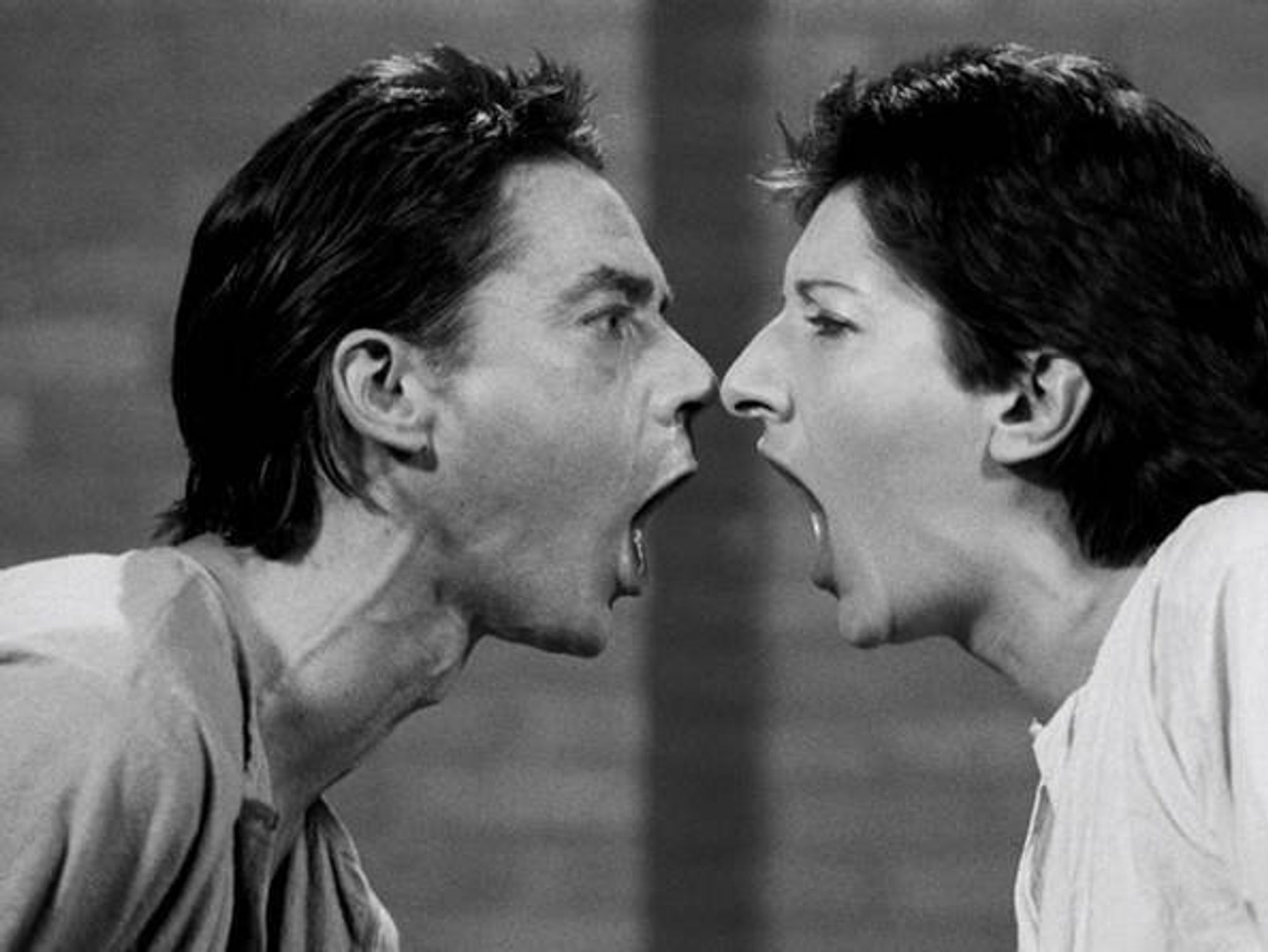 ​Marina Abramović and Ulay screaming at each other during their 1978 performance "AAA-AAA"