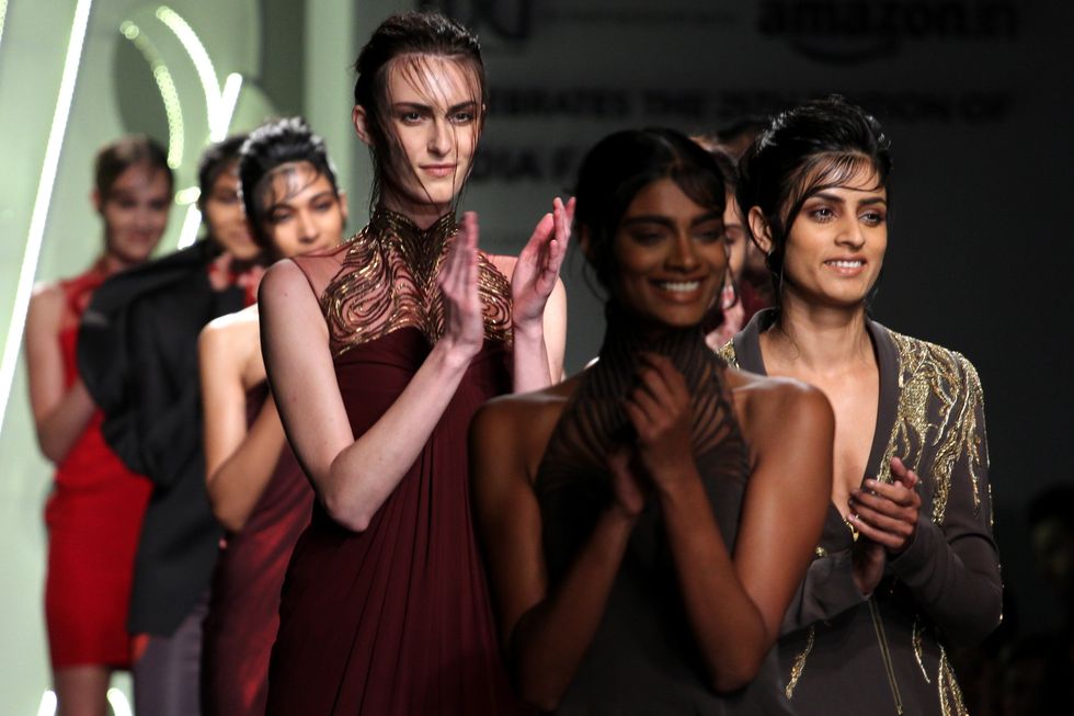 ​Models showcase creations by Indian Designer Gaurav Gupta.