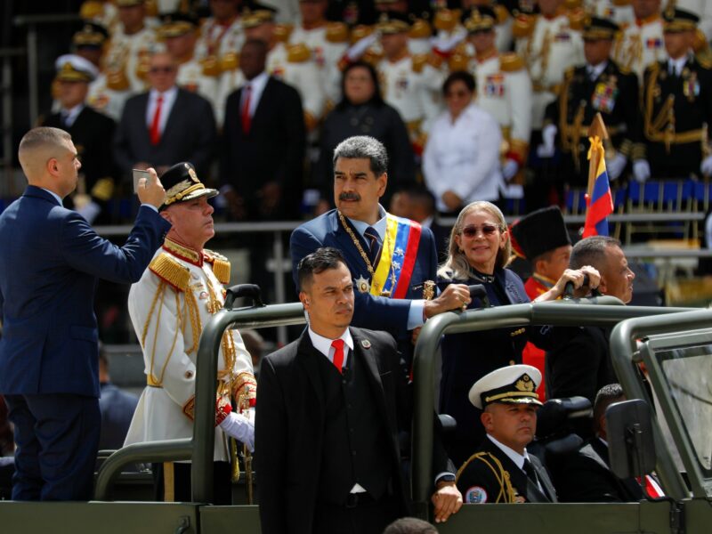 ​Nicolas Maduro, President of Venezuela, and his wife Cilia Flores take part in a military parade to mark Independence Day.