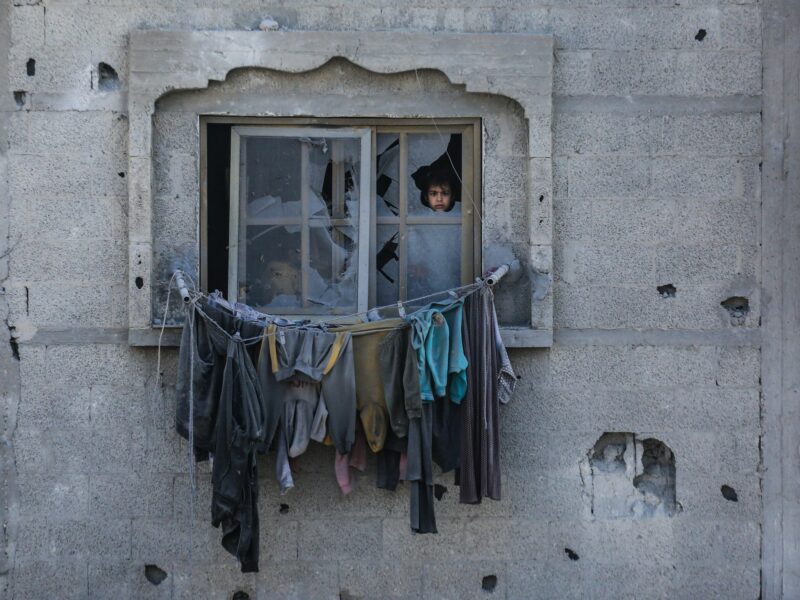 ​Palestinians inspect the damages of their home, which was bombed by Israeli army aircraft at dawn today in the city of Rafah