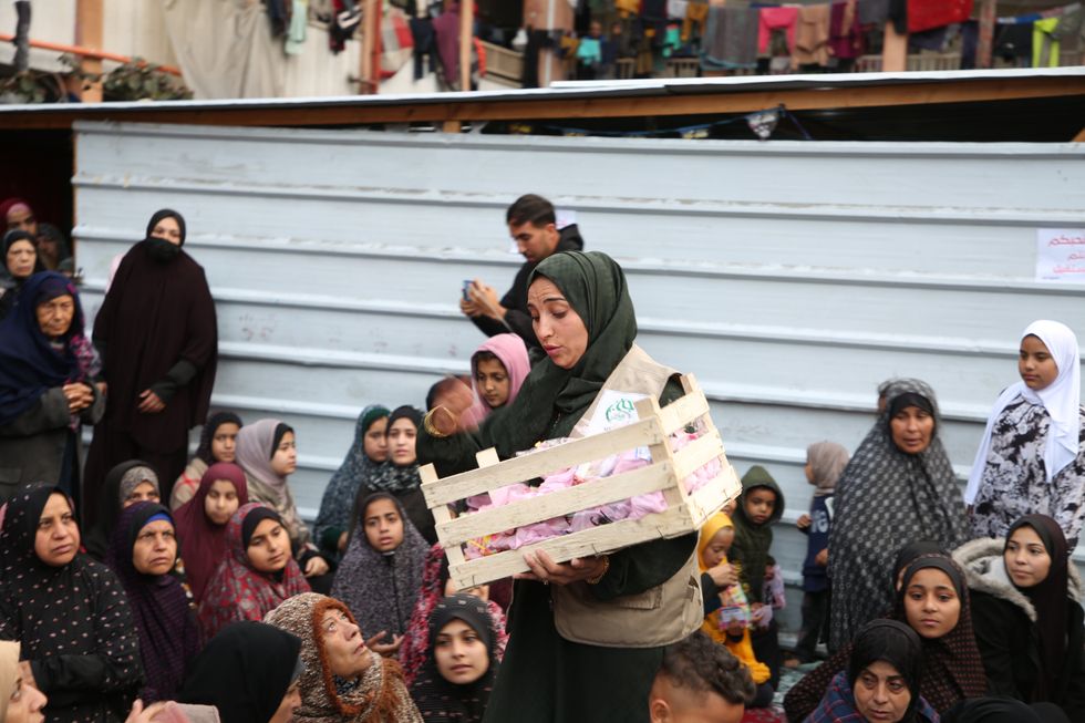 ​Palestinians, who were displaced due to Israeli attacks and took refuge at a school, performed Eid al-Fitr in Rafah, Gaza on April 10, 2024.