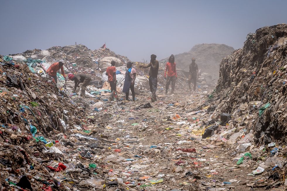​People collecting plastic waste in Dandora, the biggest dumpsite in East Africa and is the destination of the solid waste generated by Nairobi, Kenya.