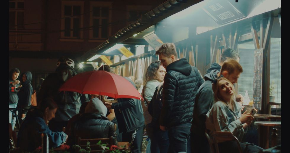 ​People enjoying the nightlife in Krakow.
