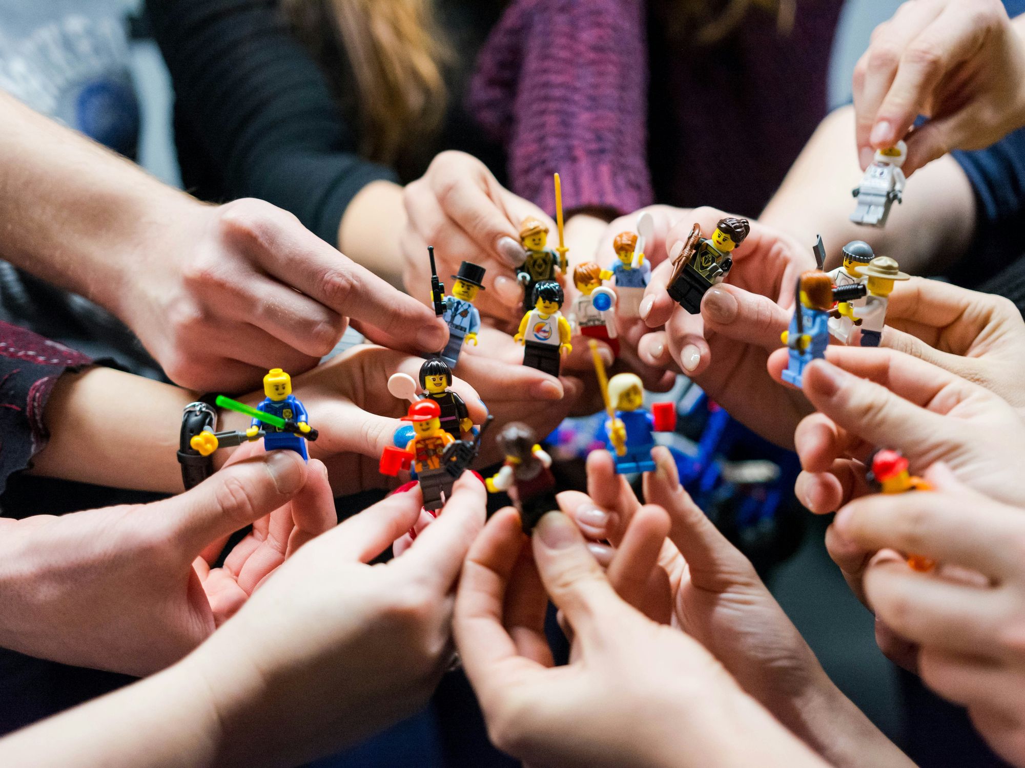 ​People holding Legos