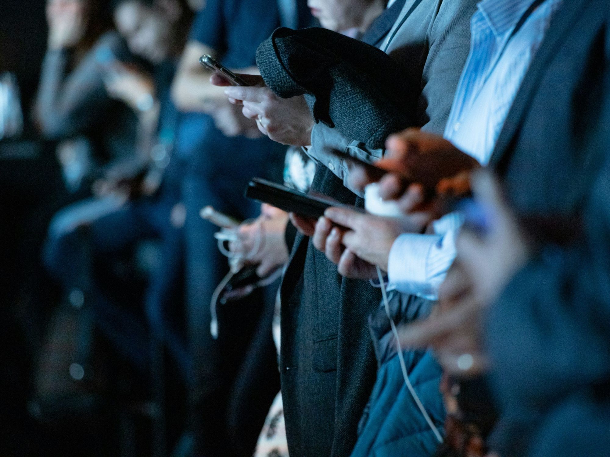 ​People using phone while standing