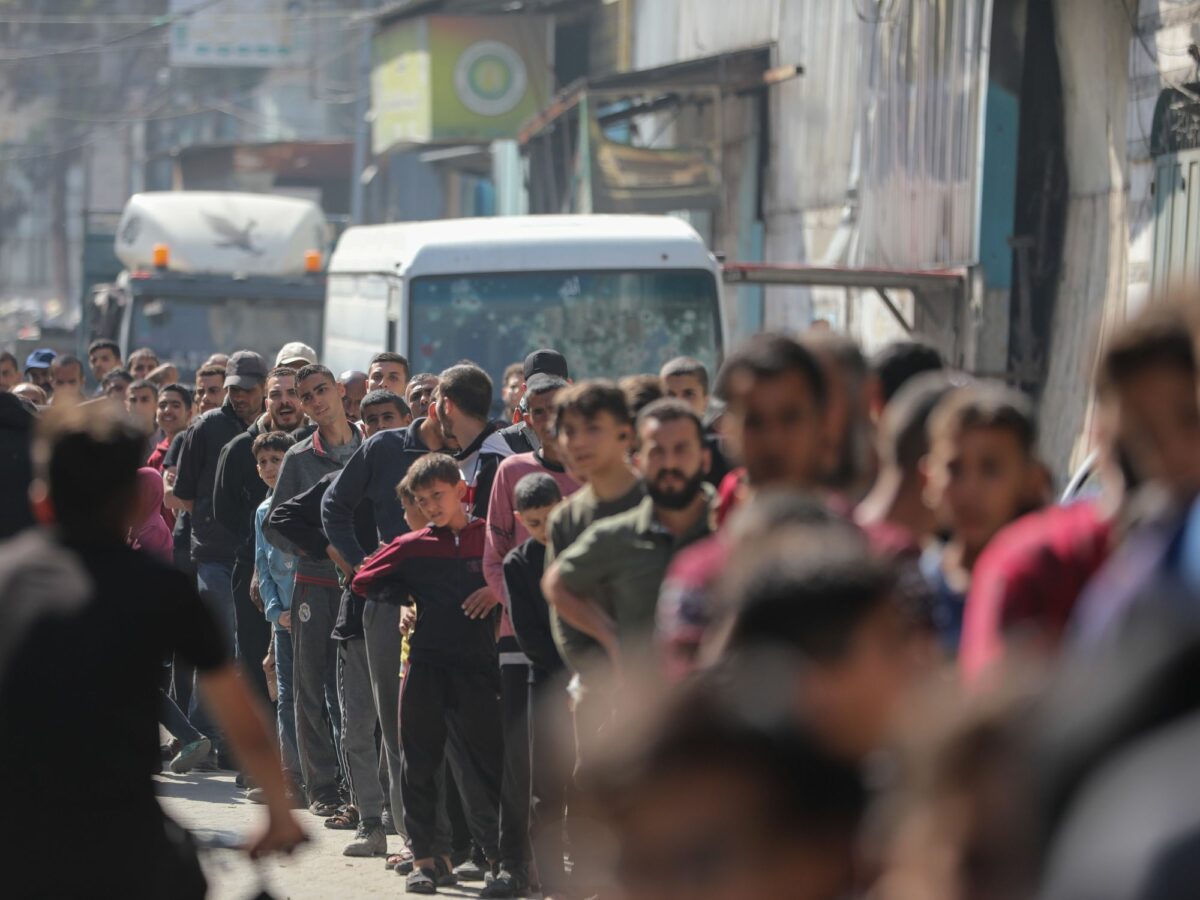 ​People wait to receive bread at a bakery in Gaza City on April 14, 2024.