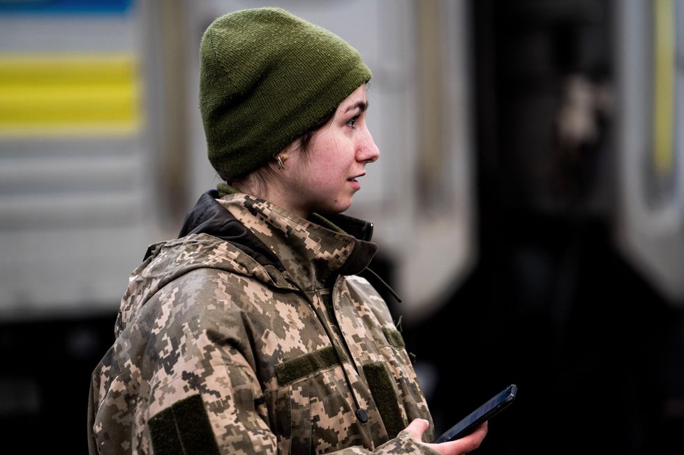 ​Photo of a woman soldier seen in Lviv, Ukraine.