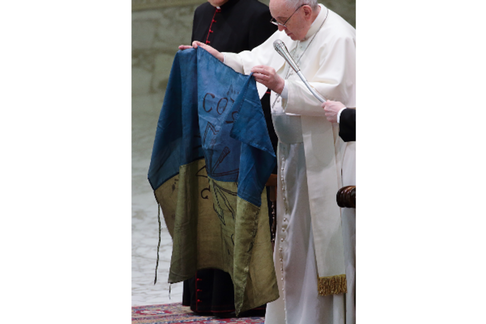 ​Photo of Pope Francis holding Ukrainian flag