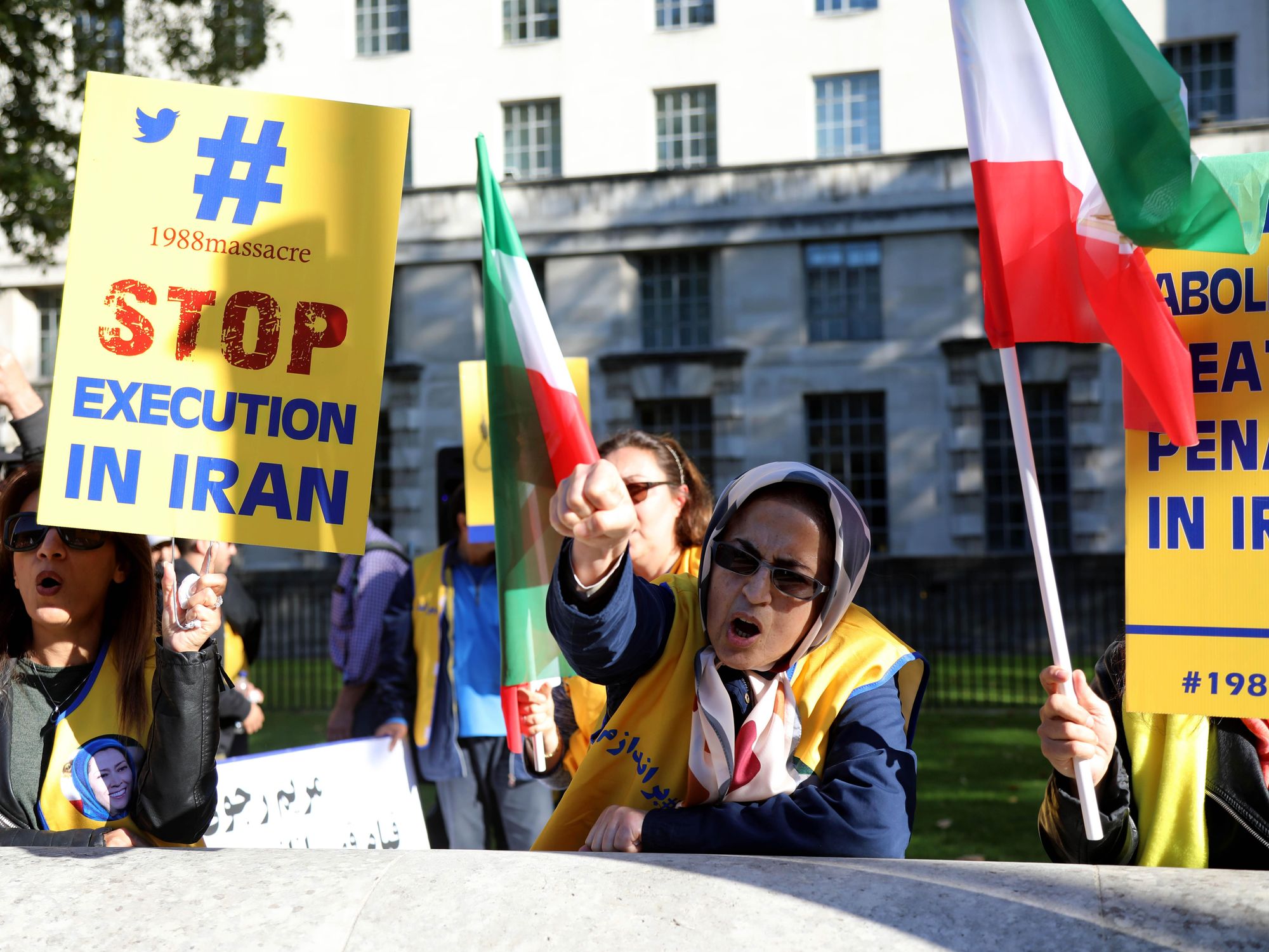 ​Protesters linked to the Iranian group Mojahedin-e Khalq demonstrate in Whitehall, London