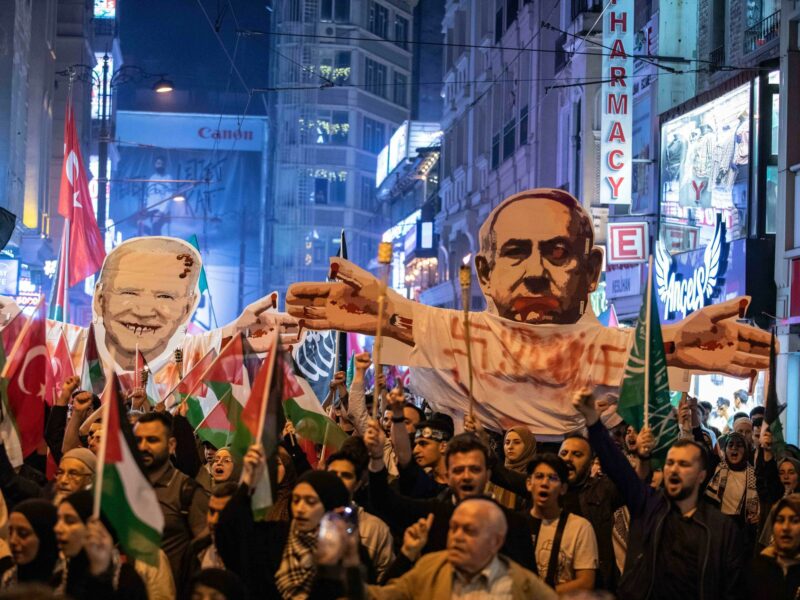 ​Protesters seen carrying models of US President Joe Biden and Israeli Prime Minister Benjamin Netanyahu during the march.