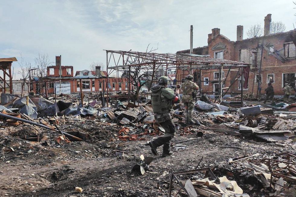 ​Russian soldiers in the town of Sudzha.