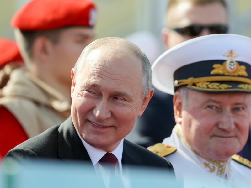 ​Russia's President Vladimir Putin and Russian Navy Commander-in-Chief Admiral Nikolai Yevmenov attend the Main Naval Parade marking Russian Navy Day.