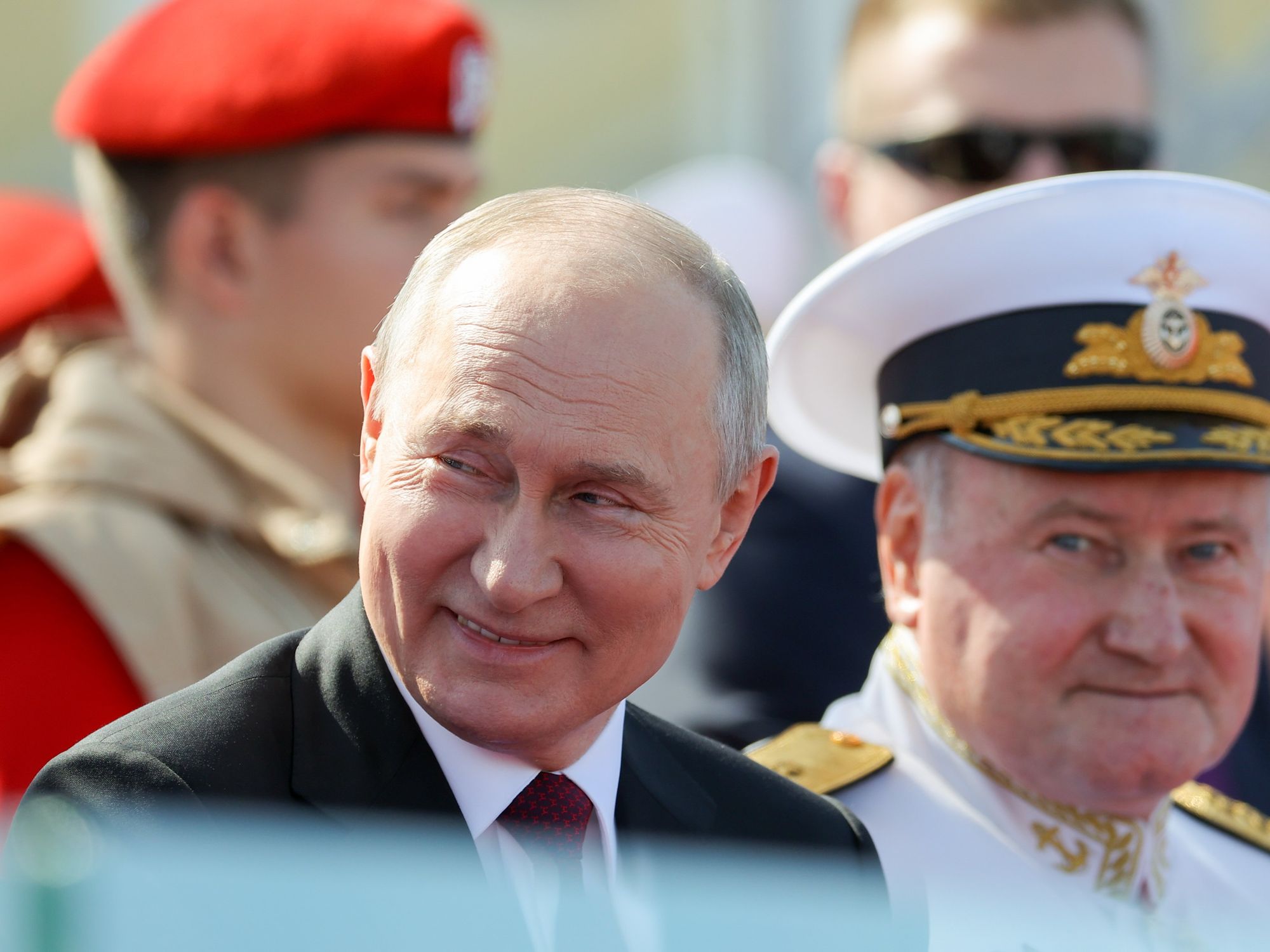 ​Russia's President Vladimir Putin and Russian Navy Commander-in-Chief Admiral Nikolai Yevmenov attend the Main Naval Parade marking Russian Navy Day.
