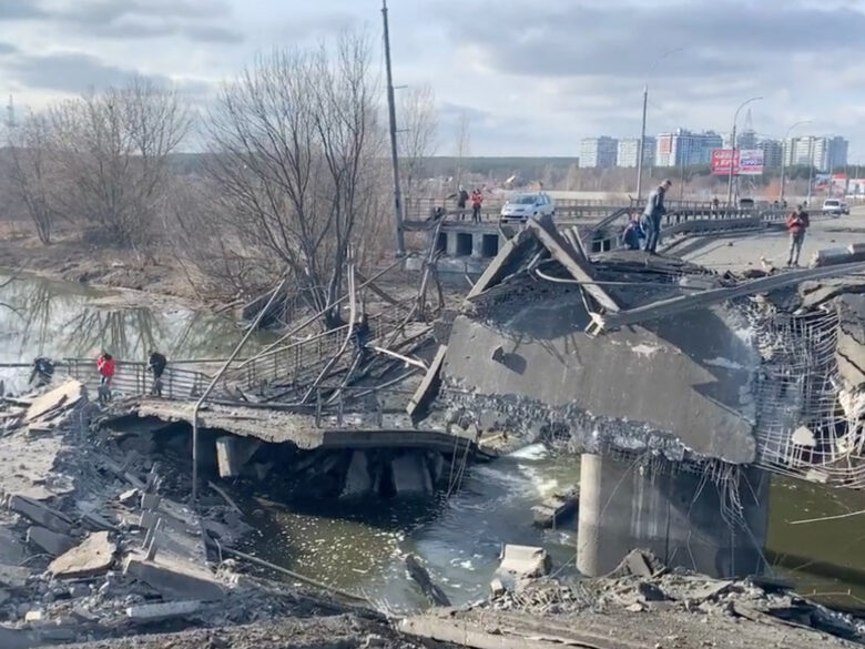​Screenshot of a video posted by AP's Francesca Ebel on Twitter showing a bridge that was blown up to prevent the advance of Russian tanks, north of Kyiv