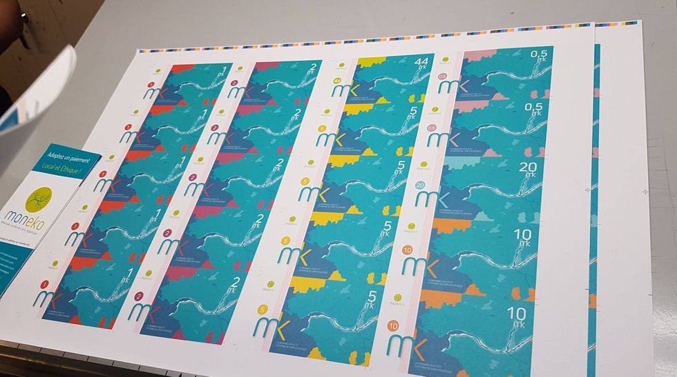 ​Sheets of printed Moneko, the local currency of Loire-Atlantique in western France, Oct. 13, 2020.