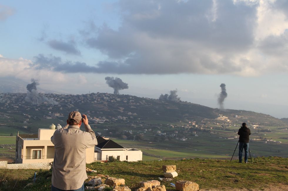 ​Smoke rises following Israeli airstrikes in Khiam, Lebanon.