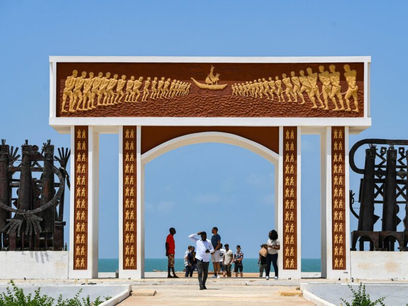 ​Some visitors at the Door of No Return in Ouidah, Benin.