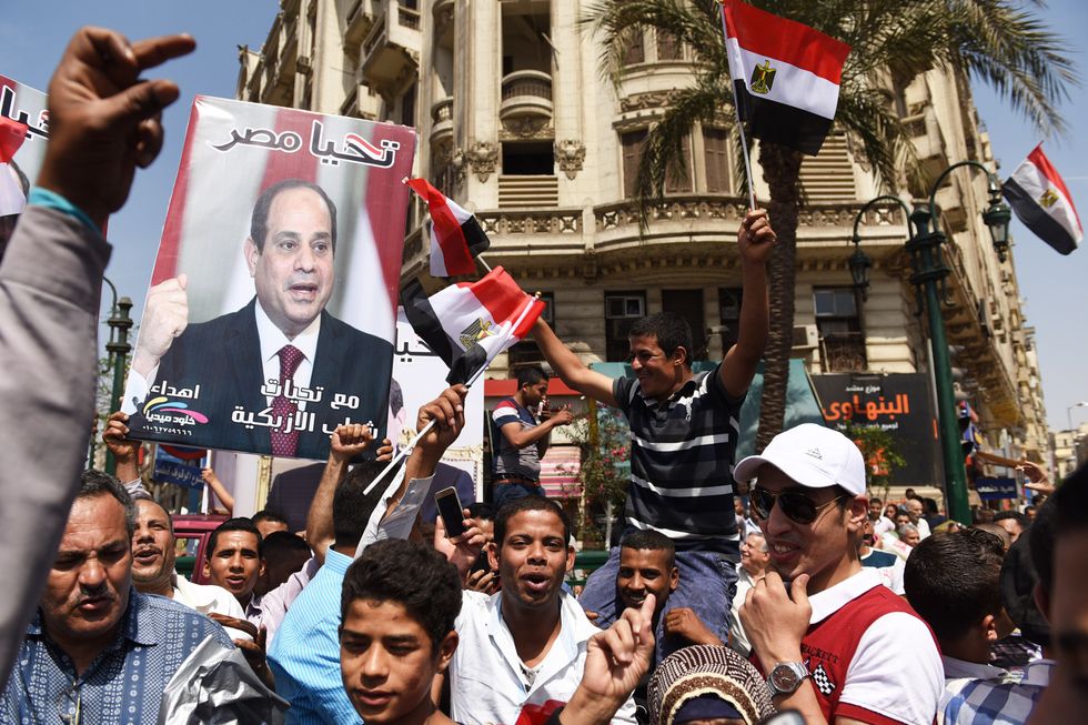 ​Supporters of Egypt's army and Egyptian President Abdel Fattah al-Sisi gather near the Tahrir Square as a way to celebrate the 34th Sinai Liberation Day in Cairo in 2016.