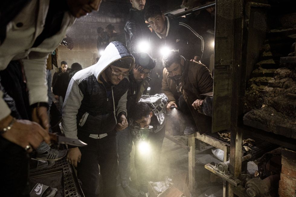 ​Teams carry out investigation in secret compartments at Sednaya Prison after the fall of the Assad regime.