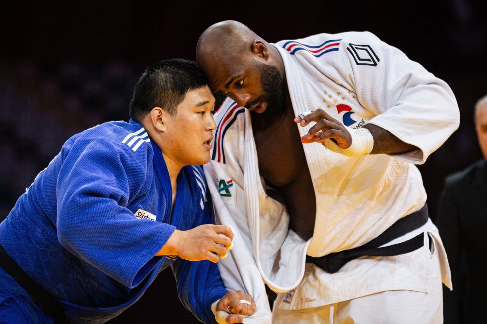 ​Teddy Riner of France and Min-jong Kim of South Korea compete during the Men's +100kg 2024 Judo Grand Slam Paris.