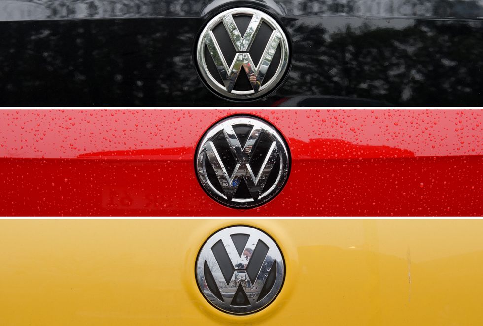 ​Three Volkswagon logo with the German flag behind it.