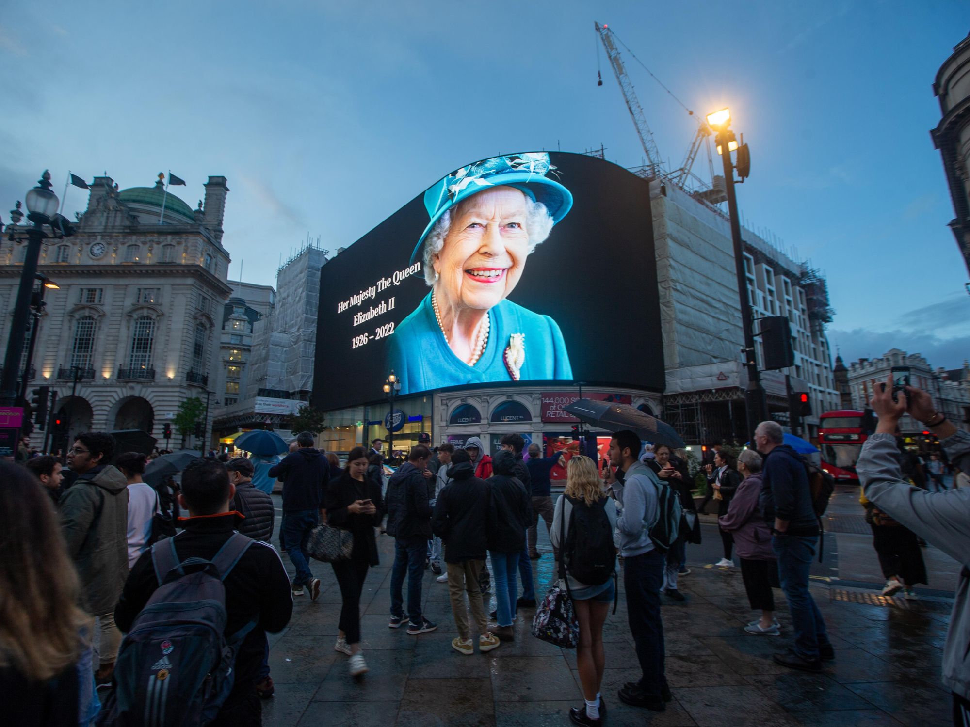 ​Tribute to Queen Elizabeth II on display on giant screen in Piccadilly Circus after her death announcement.