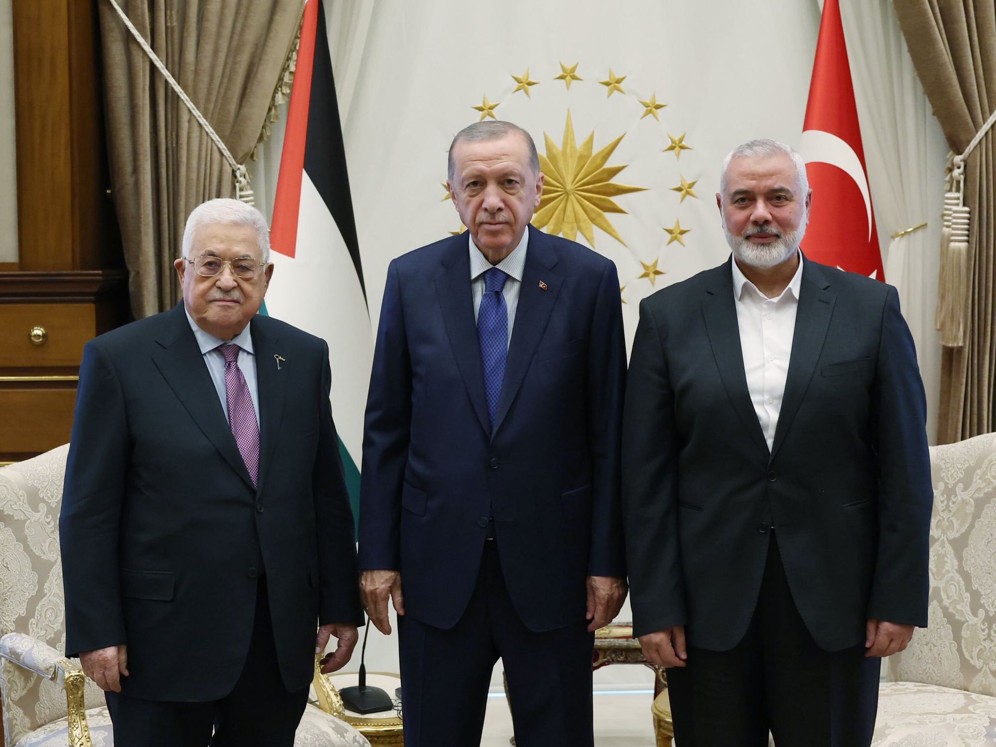 ​Turkish President Recep Tayyip Erdogan poses for a photo with Palestinian President Mahmoud Abbas (L) and former Head of the Hamas Political Bureau Ismail Haniyeh (R, now deceased) in Ankara, Turkey, on July 26, 2023.