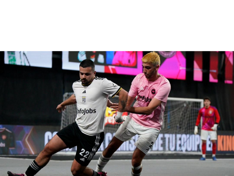 ​Two King's League player compete for the football.