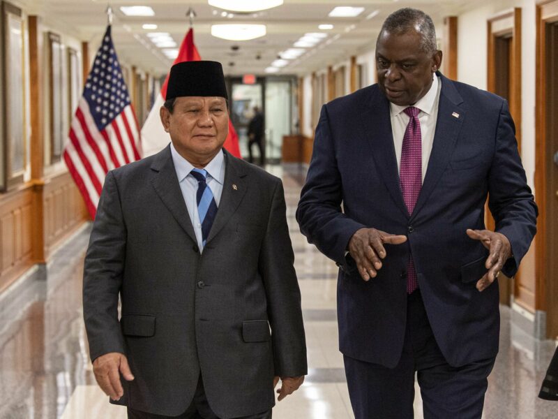 ​U.S. Secretary of Defense Lloyd J. Austin III, right, escorts Indonesian Defense Minister Prabowo Subianto, left.